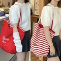 Grande borsa tote in tela da donna con motivi rosso tinta unita e strisce bianche e rosse - merci Righe Rosse