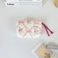 Quilted floral coin purse with ribbon print, zipper closure and woven drawstring detail - Rose Ribbon Pink