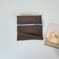 Detail of brown checkered nylon pouch with contrasting blue zipper and ring pull - Brown