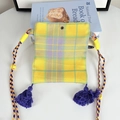 Detail of colorful plaid crossbody bag with purple tassels and adjustable woven strap - Yellow and Purple Plaid Mini Crossbody Bag