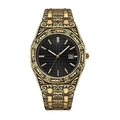 Detail of vintage carved gold watch case with black waffle dial and date window display - Gold Case Black Dial