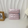 Detail of pink heart-quilted PU jewelry pouch with blue contrast zipper and round pull - Pink Heart