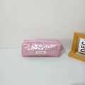 Detail of pink glossy pencil case with heart quilting and May Rabbit logo tag - Big Heart Pink