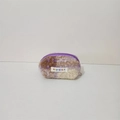 Detail of colorful plush plaid shell pouch with purple zipper and brand label tag - Purple Coffee Plaid