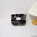 Detail of plush paisley cosmetic bag showing soft texture and high-quality zipper closure - Ethnic Black Totem