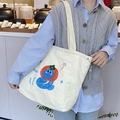 Détail de la broderie animale et du texte ice sur le grand sac fourre-tout en toile - Sac Bandoulière Cordon Broderie Éponge Mignon : Serpent Bleu (Beige)