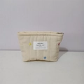 Beige quilted makeup bag with colorful heart embroidery and top zipper closure - Off-white Heart Embroidered Lipstick Bag
