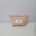 Quilted pink makeup bag featuring heart embroidery and zipper closure for storage - Pink Heart Embroidered Lipstick Bag