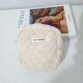 Close-up of white plush square organizer bag with MAY RABBIT label and metal zipper detail - Creamy White