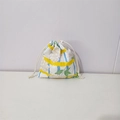 Close-up of drawstring closure on floral printed cotton organizer pouch with yellow stripes - White Peony