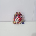 Close-up of floral cotton drawstring pouch with colorful abstract flower patterns - Colorful Floral