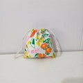 Detailed close-up of a floral cotton drawstring storage bag with a white cotton rope closure - Spring Garden Floral