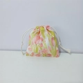Close-up of small cotton drawstring bag with pink tulip and white bunny floral patterns - Rabbit Tulip Yellow Green