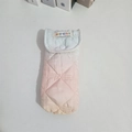 Close-up of quilted padded pouch with gradient colors and secure snap button closure - Quilted Rainbow