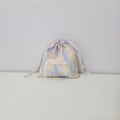 Detail of floral cotton drawstring bag with tulip print and white cord closure - Rabbit Tulip Yellow Blue