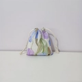 Close-up of floral drawstring pouch made of cotton with purple tulip prints - Purple Tulip