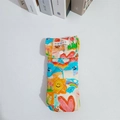 Detailed macro view of quilted cotton eyewear pouch with colorful cartoon patterns - Graffiti
