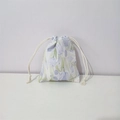 Detail view of cotton drawstring pouch featuring purple tulip patterns on white background - Rabbit Tulip Blue Green