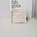 Detail of cream quilted organizer with heart pattern and pink ribbon bow decoration - Off-white Heart