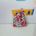 Close-up of floral cotton drawstring pouch with red and blue flowers and white woven rope - Colorful Floral