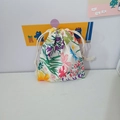 Close-up of cotton drawstring pouch with vibrant floral prints and cream cotton rope - Spring Garden Floral