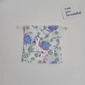 Detail of floral cotton drawstring storage bag with blue and green flower patterns - Galsang Flower Blue