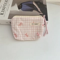 Detail of pink plaid floral makeup pouch with metal zipper and purple drawstring - Plaid Pink Bow