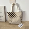 Detail of beige corduroy polka dot tote with wide handles and bronze snap closure - Khaki Polka Dot Handbag
