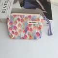 Close-up of floral canvas pouch with tulip pattern, metal zipper and purple woven strap - Flower Sea Tulip
