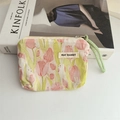 Close-up of May Rabbit floral fabric pouch featuring tulip prints and a green woven zipper - Rabbit Tulip Yellow Green