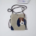 Detail of beige fleece mini phone bag featuring a cute cartoon dog patch and rope strap - Cartoon Dog