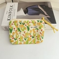 Detail of yellow tulip floral canvas pouch with zipper and bright yellow lanyard handle - Floral Tulip Yellow