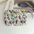 Detailed close-up of floral cotton pouch with zipper and May Rabbit woven label - Floral Tulip Blue
