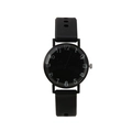 Detail of minimalist black quartz watch featuring a matte silicone strap and white numerals - Black