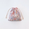 Close-up of drawstring closure on floral tulip print cotton jewelry storage bag - Pink Purple
