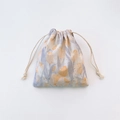 Detailed view of tulip print canvas drawstring pouch with cotton ropes and soft floral texture - Yellow Blue