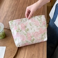 Floral makeup bag featuring pink rose jacquard on a textured beige canvas fabric - Embossed Peony Pink