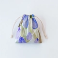 Detail view of cotton drawstring bag featuring a watercolor purple tulip floral print - Purple Tulip