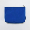 Detail of bright blue waterproof nylon storage pouch with zipper and texture - Royal Blue