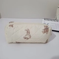 Detailed view of diamond-quilted cotton bag with vintage bear and rabbit floral prints - Rabbit and Bear