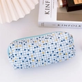 Quilted floral pencil case with blue checkered pattern and zipper on white desk - Blue Polka Dot