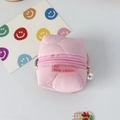 Close-up of pink quilted earphone case with pearl charm and floral embroidery detail - Quilted Gourd Pink
