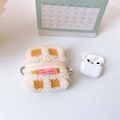 Detail showing waffle texture plush earphone case with golden zipper and large pearl accessory - Yellow Plaid (Upgraded Version)
