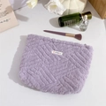 Detailed view of plush purple makeup bag with woven texture and premium zipper closure - Chinese Knot Taro Purple