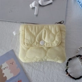 Detail of yellow quilted heart pouch featuring front snap pocket and side loop - Quilted Large Heart Yellow