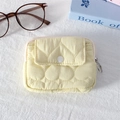 Detailed view of yellow heart quilted mini coin purse on a soft fabric background - Quilted Large Heart Yellow