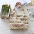 Flat lay of colorful striped plush tote bag with tablet, headphones and tulips - Yellow Pink Striped Plush