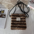 Close-up of brown striped plush fabric texture and shoulder strap on messenger bag - Brown Coffee Striped Fleece
