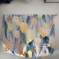 Portable toiletry bag with blue tulip floral print and top zipper closure - Blue Tulip
