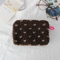 Detailed close-up of brown plush cosmetic bag with polka dots and pink zipper cord - Brown Small Heart